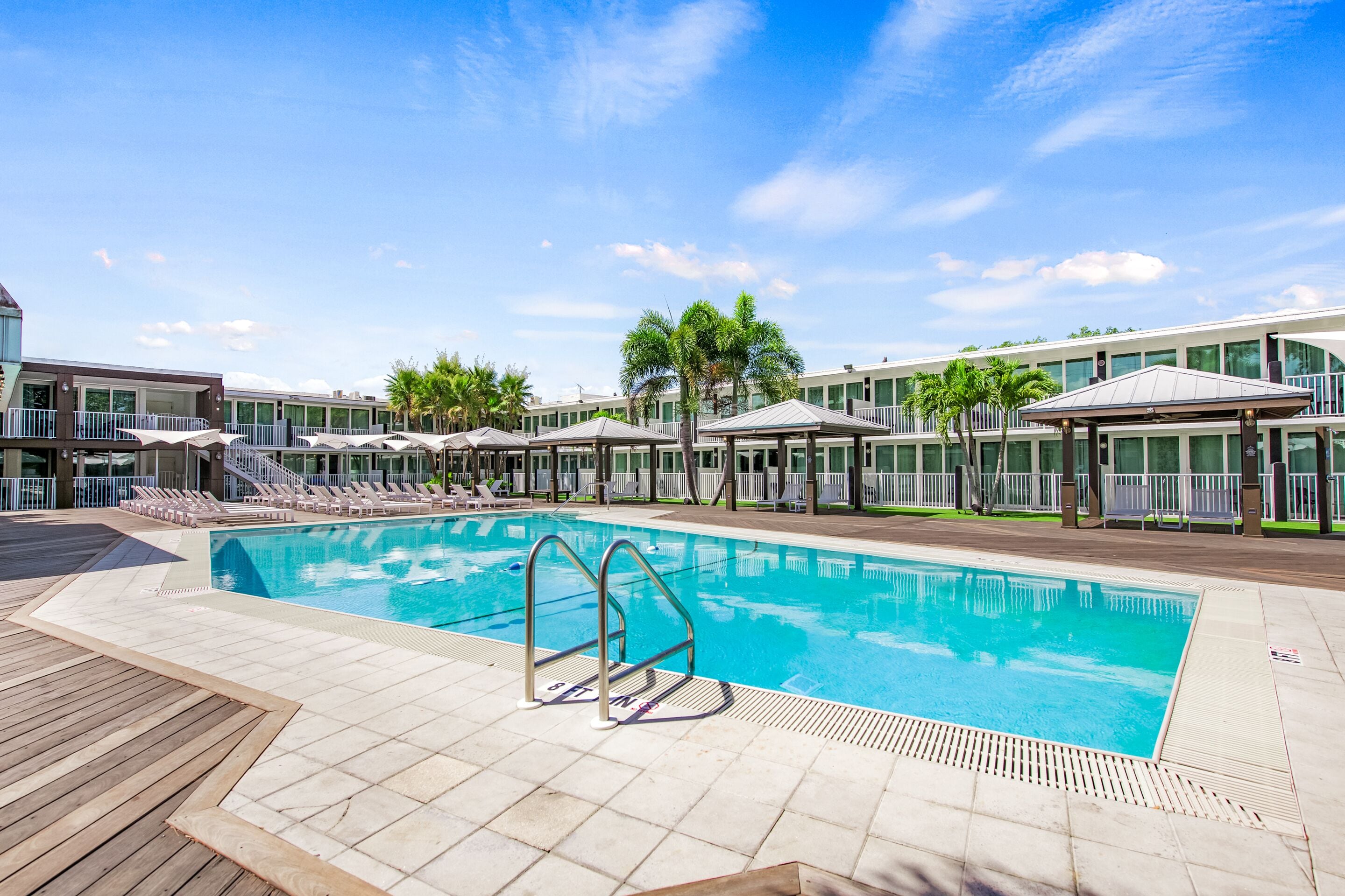 Outdoor pool, open 8:00 AM to 10:00 PM, free cabanas, pool umbrellas