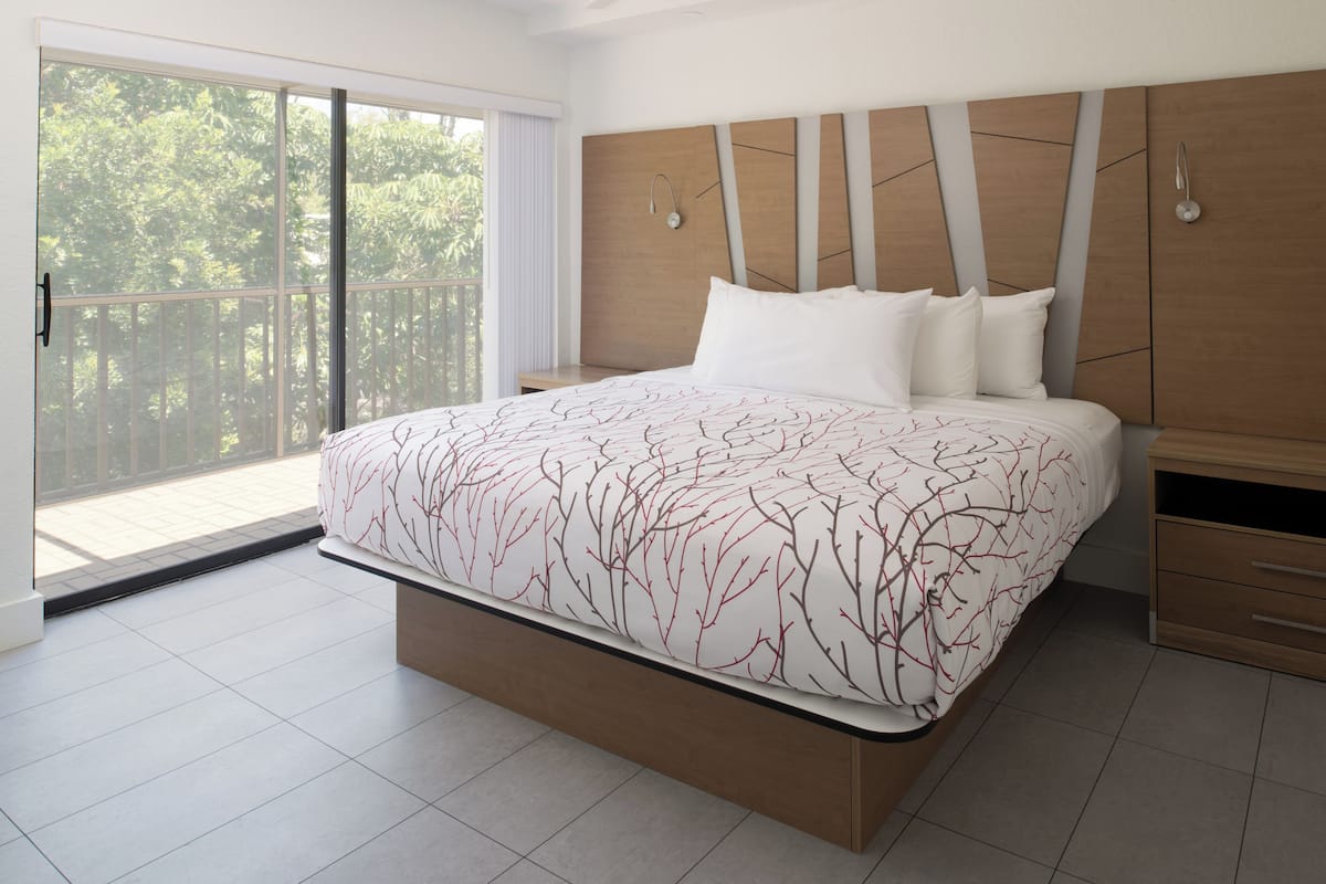 Habitación Deluxe | 1 habitación, camas con pillow-top y caja de seguridad en la habitación