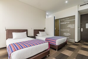 Standard Twin Room | In-room safe, individually decorated, individually furnished, desk