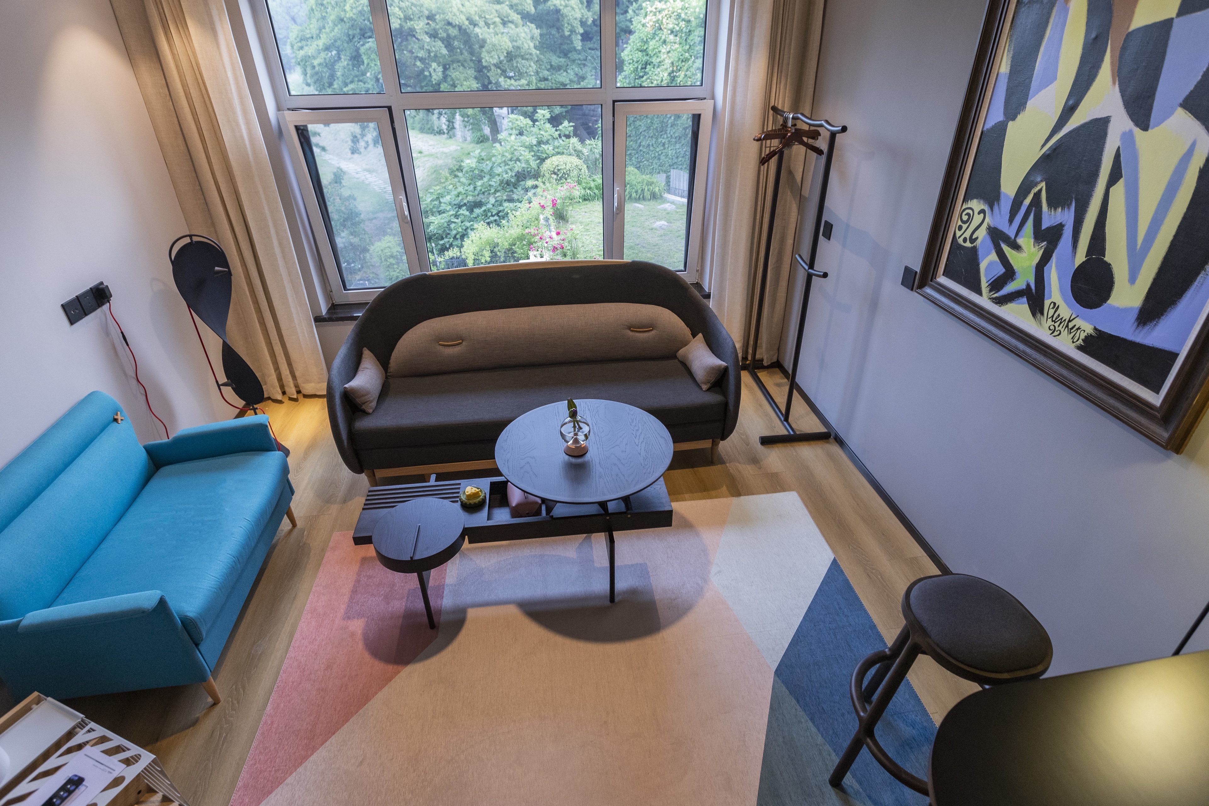 deluxe suite garden view | 1 bedroom, in-room safe, desk, blackout curtains