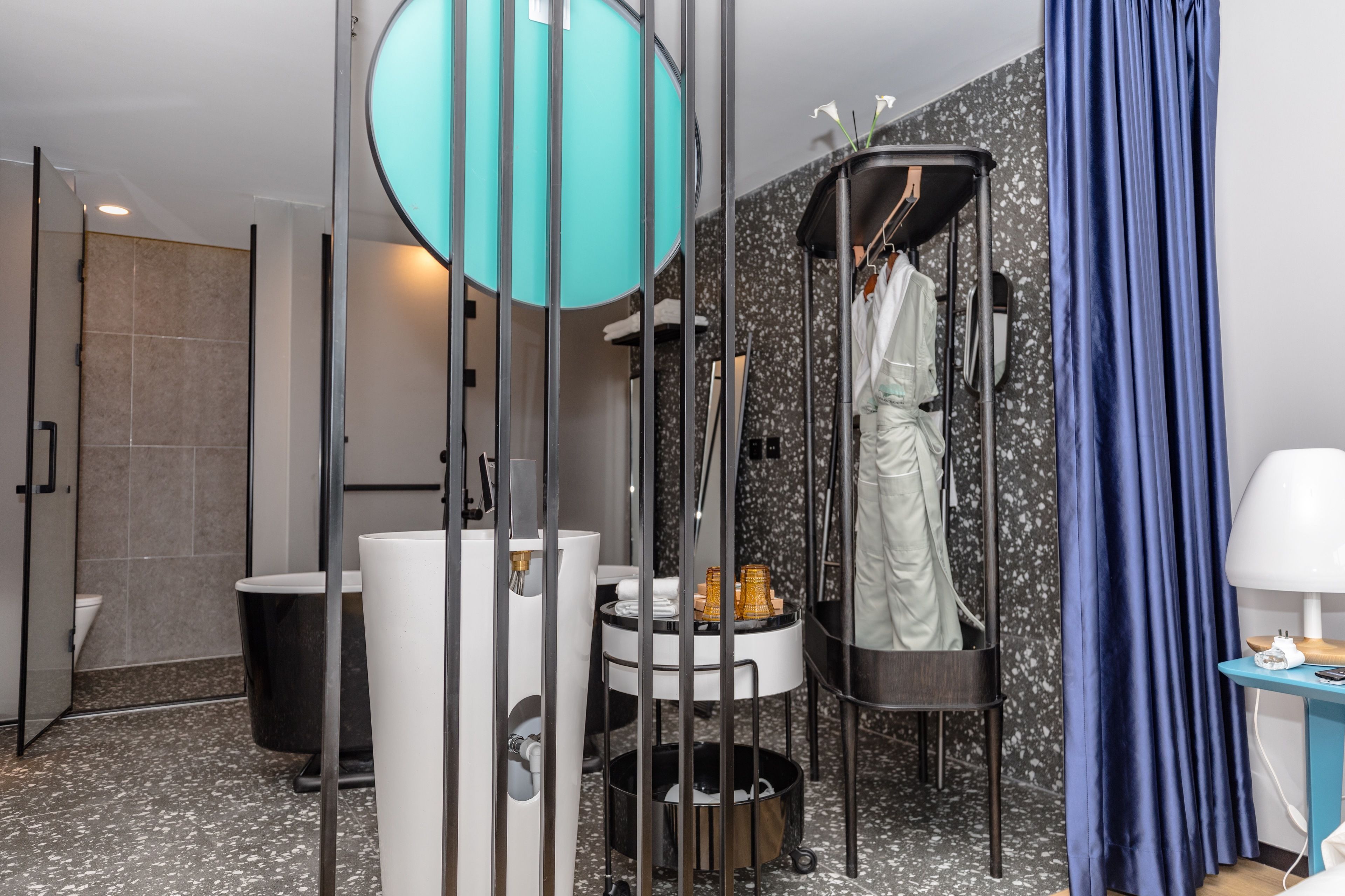 deluxe suite garden view | bathroom | free toiletries, hair dryer, bathrobes, slippers