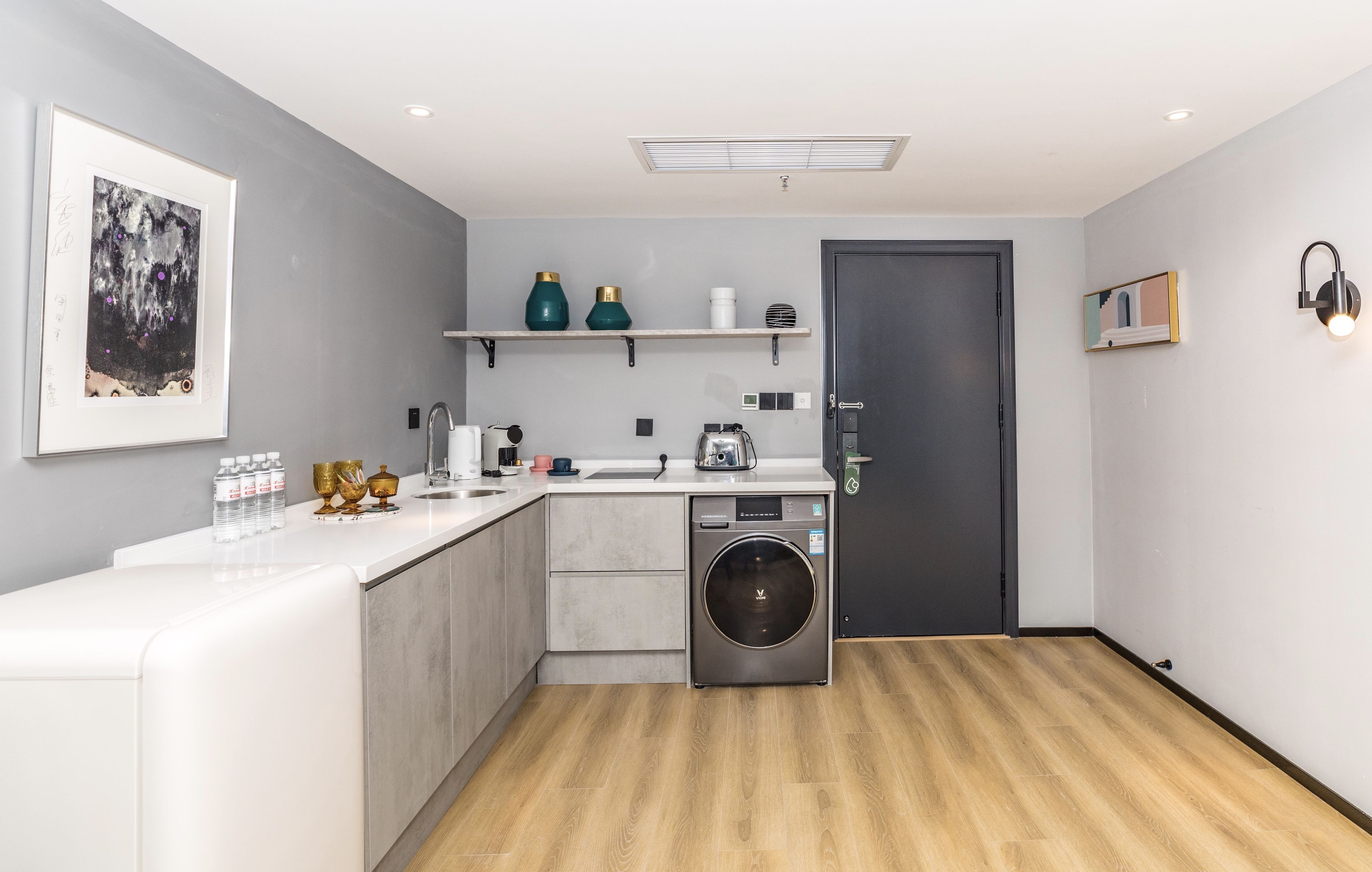 deluxe suite garden view | private kitchen | fridge