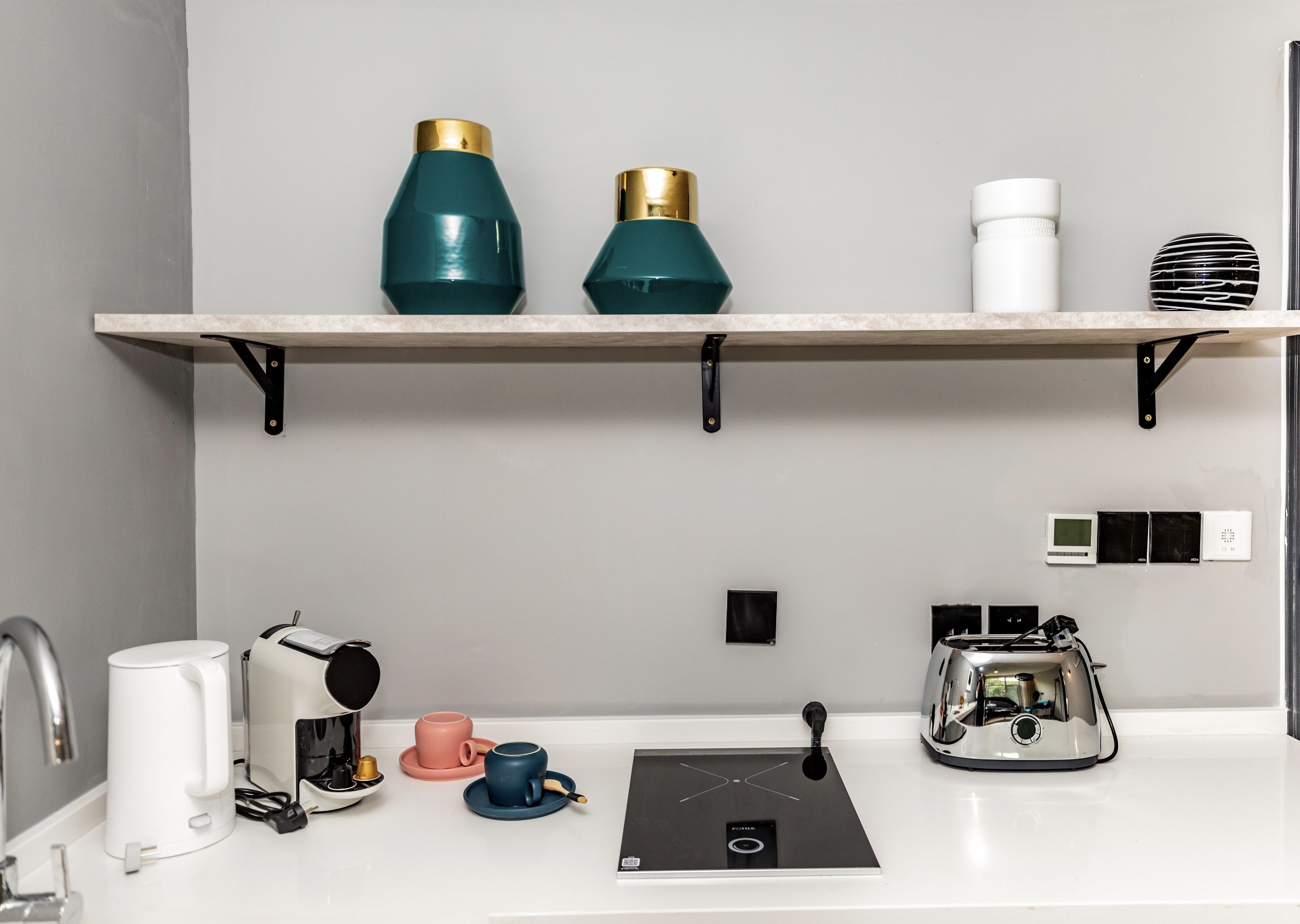 deluxe suite garden view | 1 bedroom, in-room safe, desk, blackout curtains