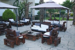 Indoor pool, outdoor pool, open 8 AM to 8 PM, pool umbrellas