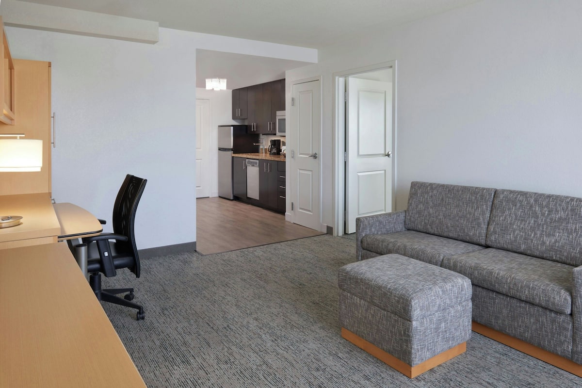 Suite, 1 Bedroom | Living room | 55-inch LCD TV with cable channels, TV