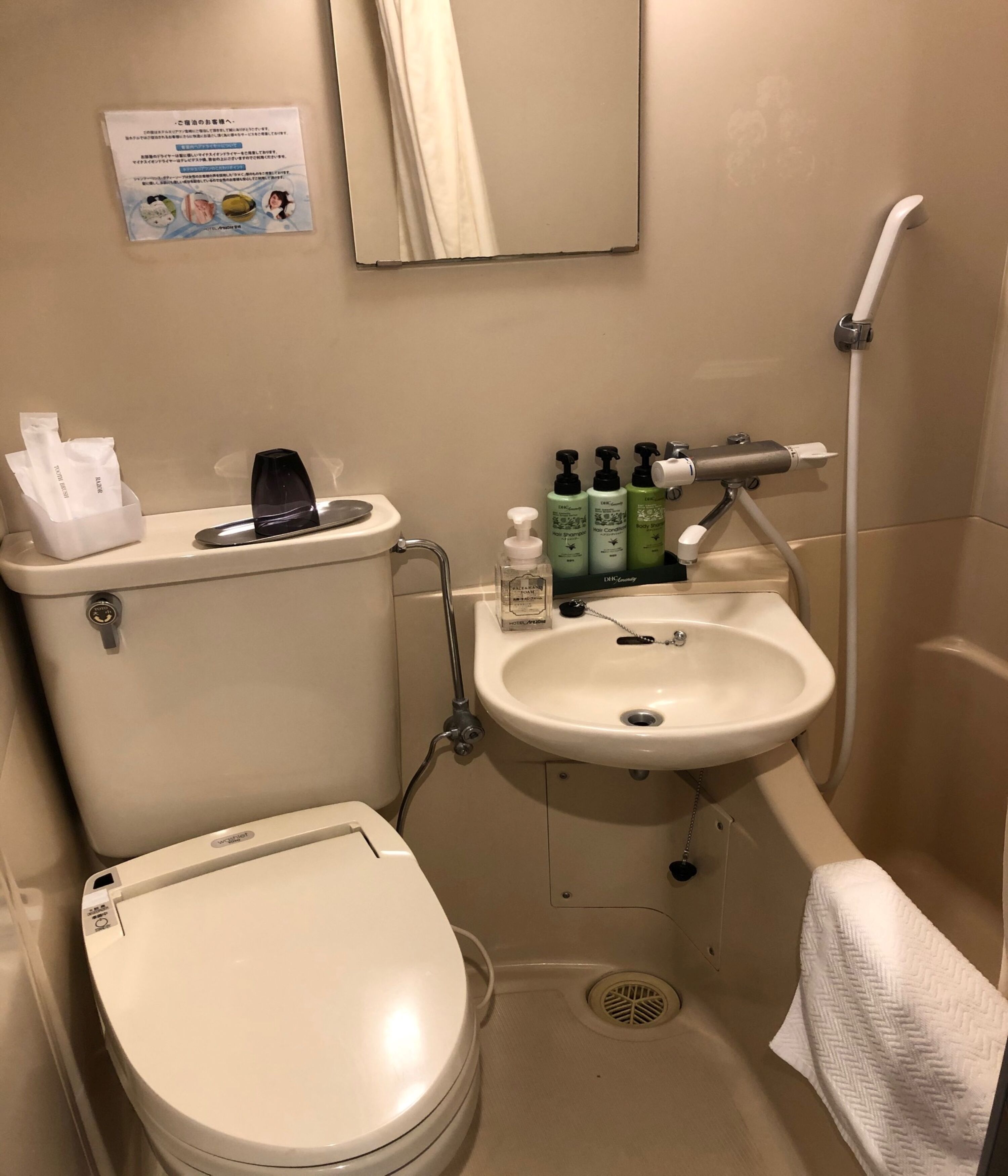 shower, hair dryer, slippers, bidet