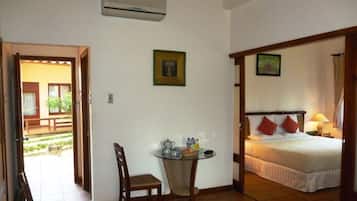 Deluxe Room | 1 bedroom, down duvets, minibar, in-room safe