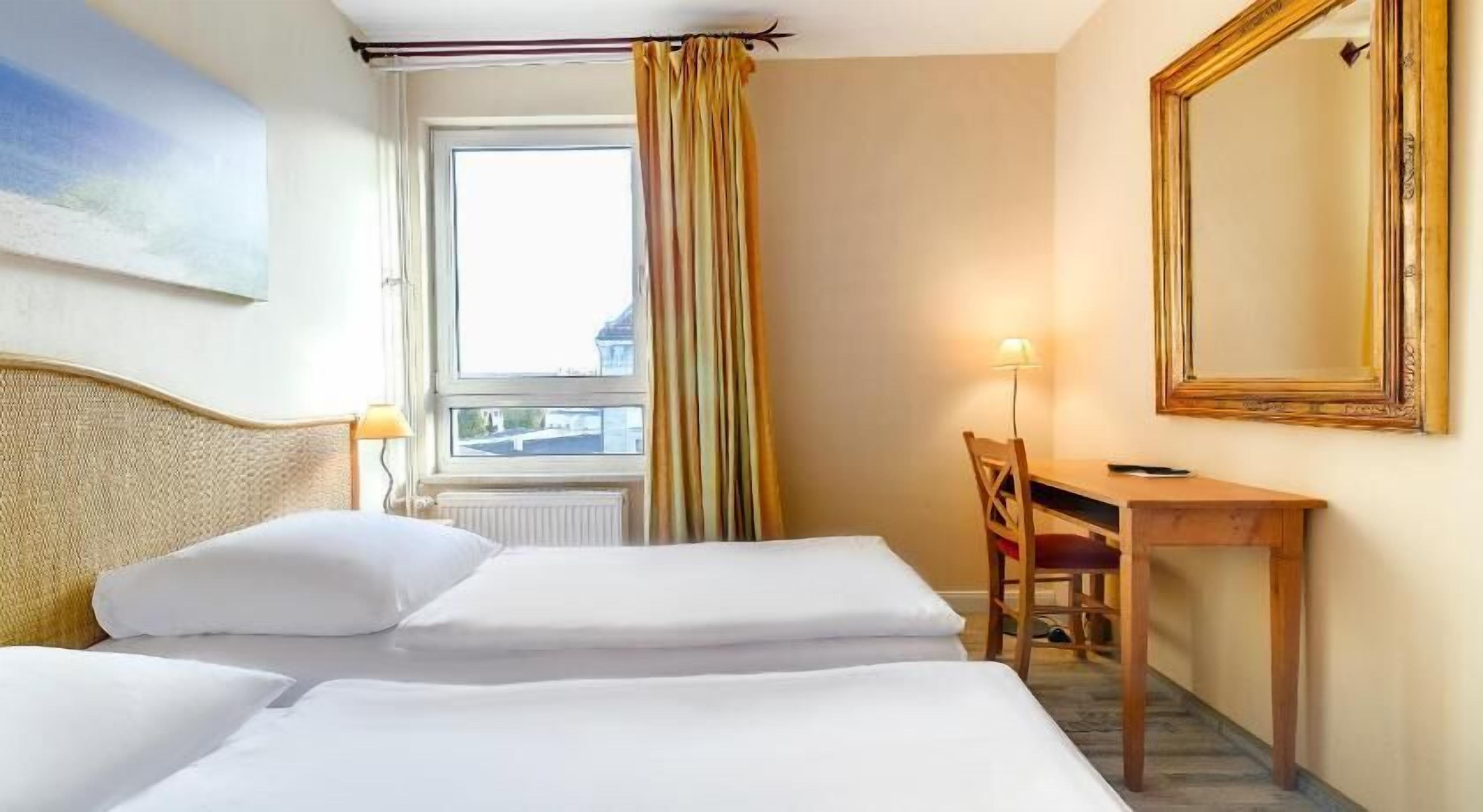 Hypo-allergenic bedding, desk, blackout curtains, soundproofing