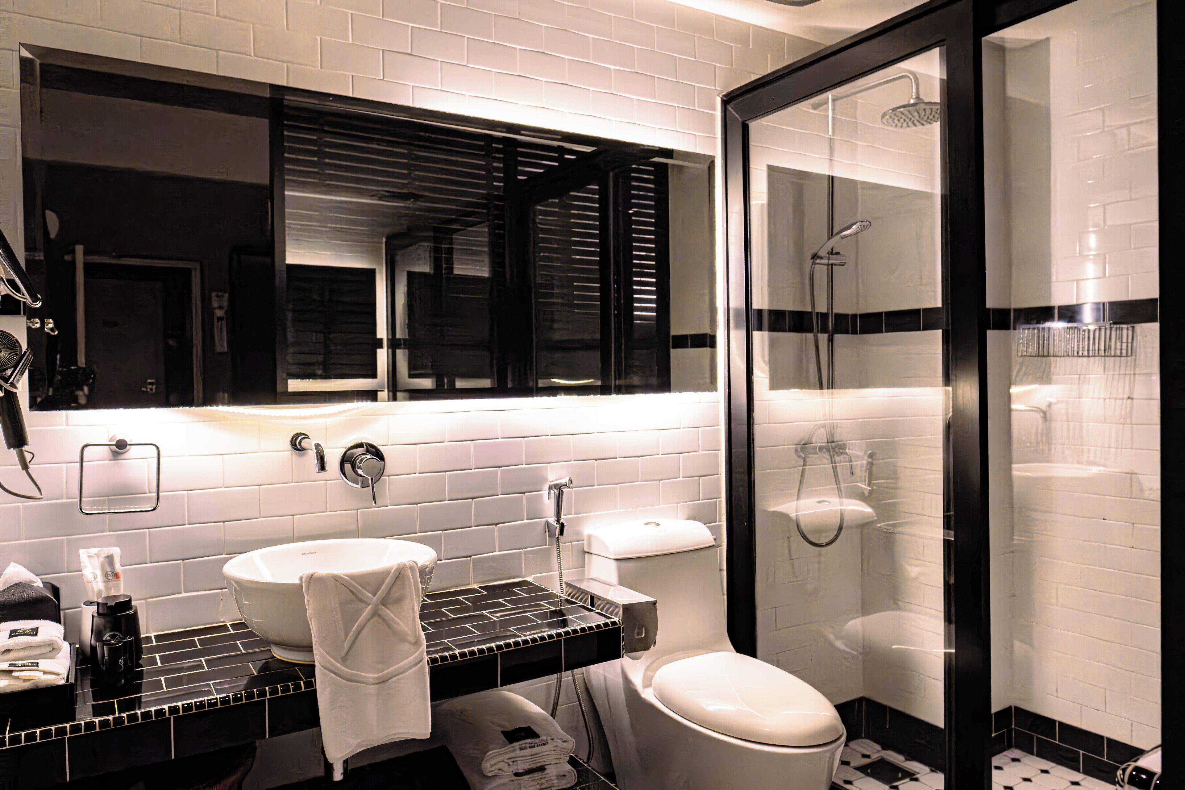 standard queen no window | bathroom | shower, hair dryer, slippers, towels