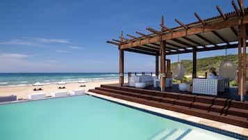 2 piscinas al aire libre, tumbonas