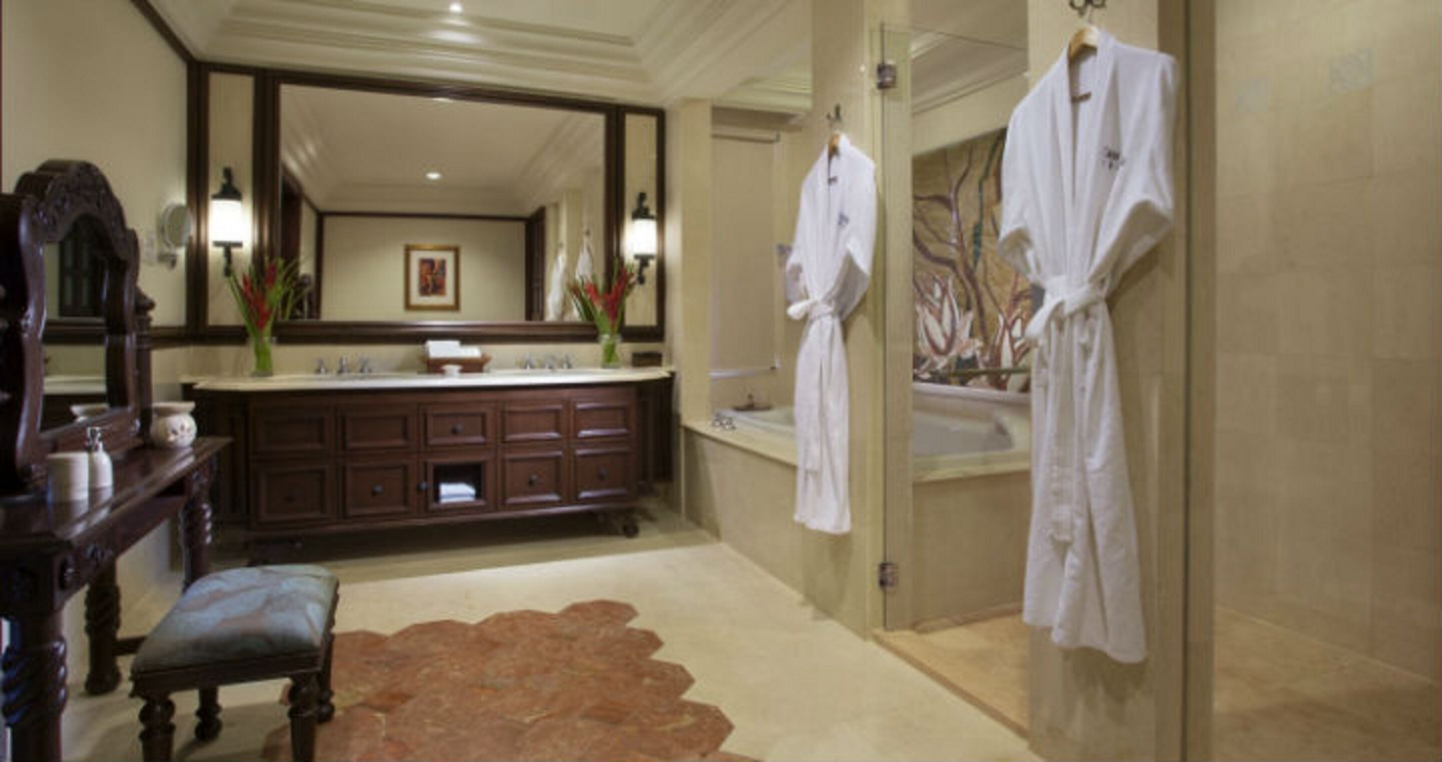 separate bathtub and shower, deep-soaking bathtub, rainfall showerhead