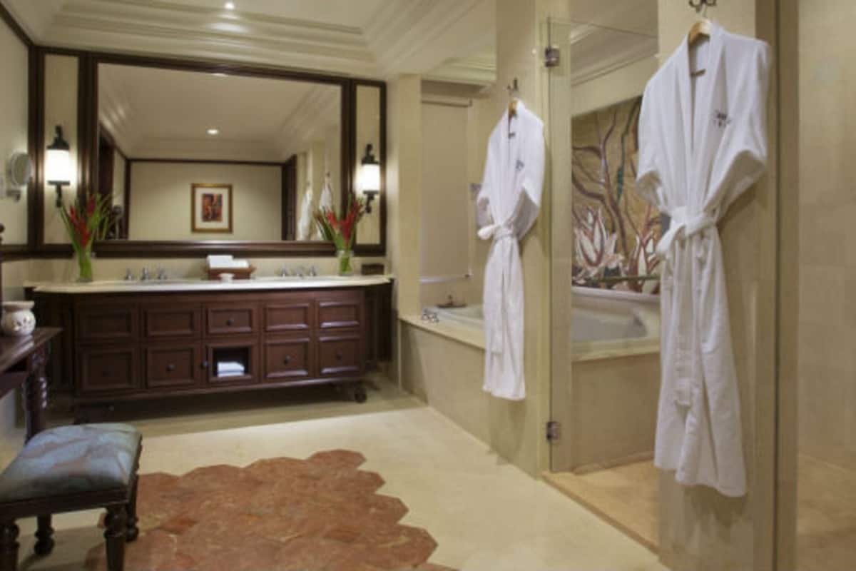 separate bathtub and shower, deep-soaking bathtub, rainfall showerhead