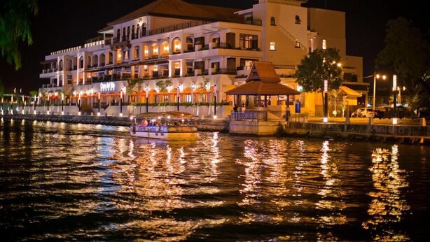 A waterfront hotel with multiple balconies, a boat dock, and a gazebo. - Casa del Rio Melaka (Malacca City)