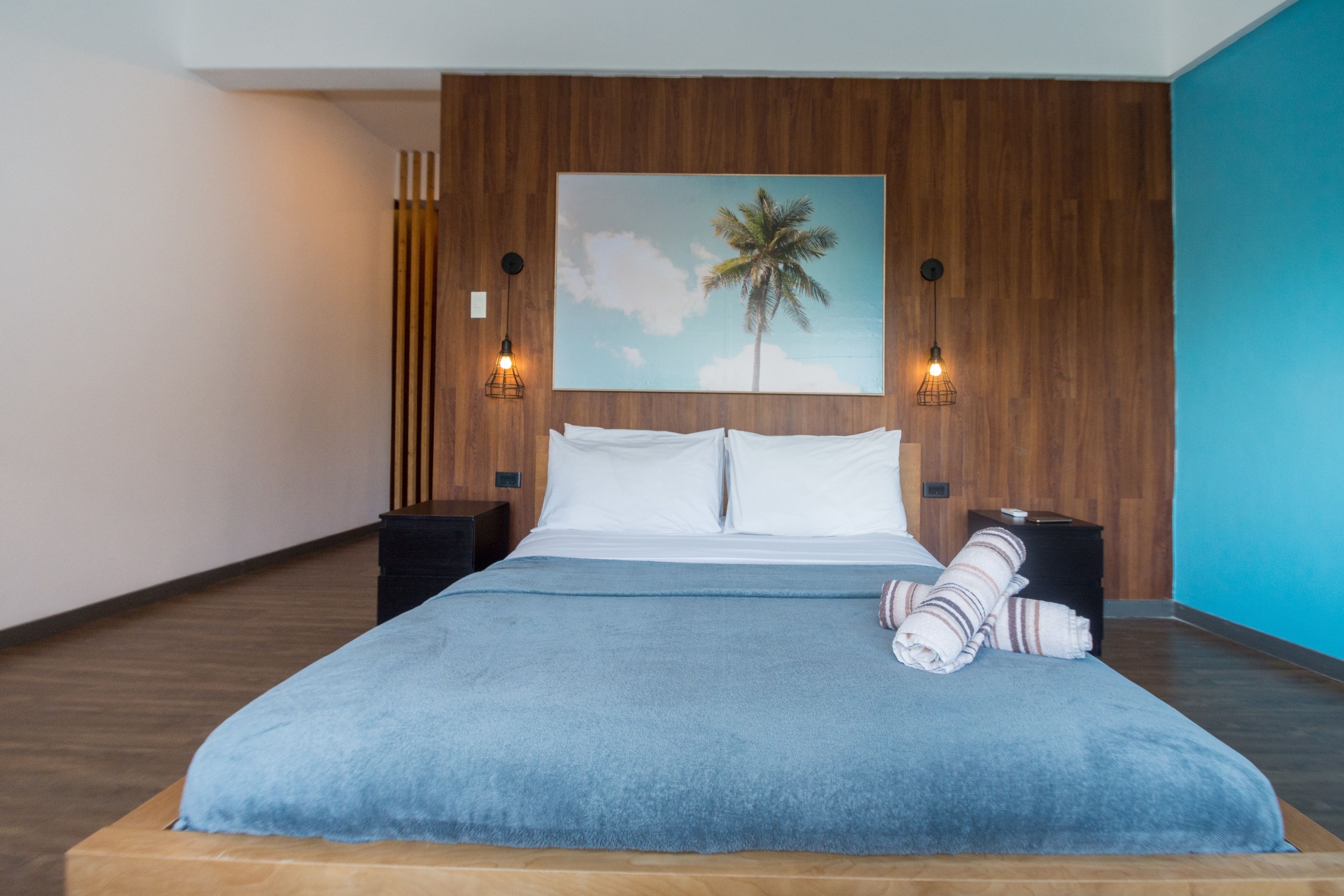 Habitación Deluxe | Ropa de cama de alta calidad, camas extra y wifi gratis 