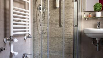 Shower, rainfall showerhead, eco-friendly toiletries, hair dryer