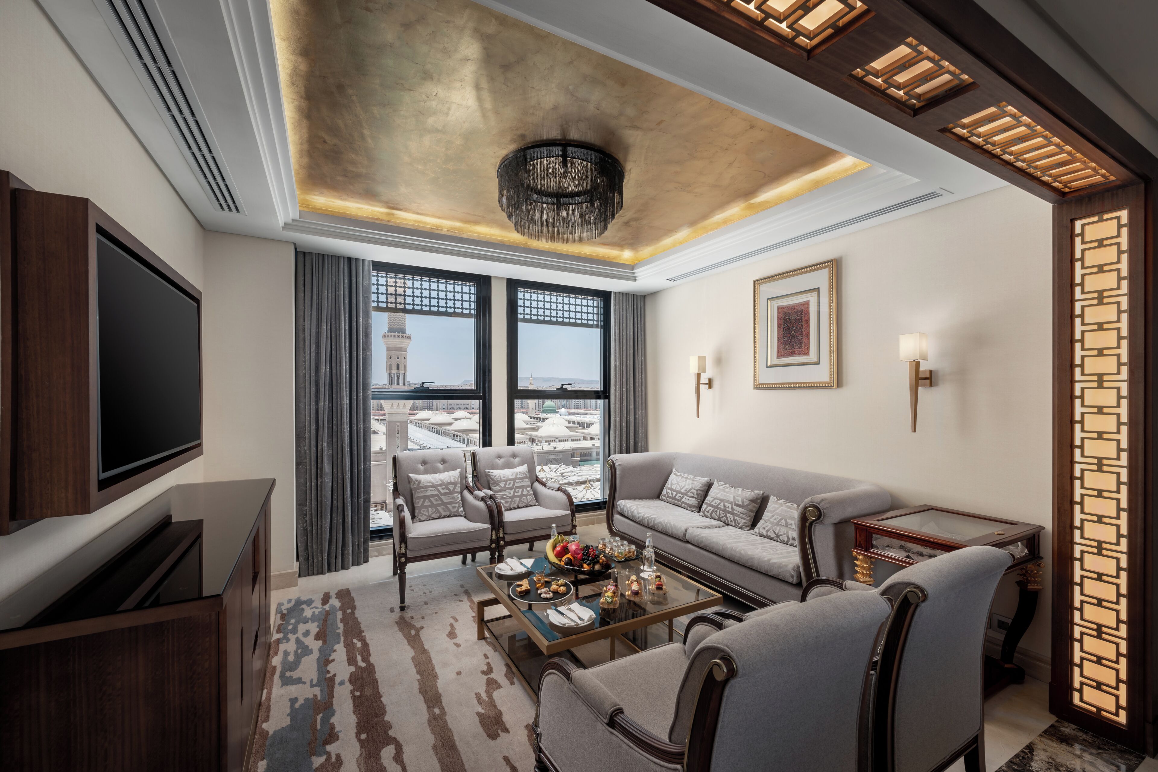 Royal Suite, 2 Bedrooms (Haram View, 1 Super King & 2 Double) | Living area | 55-inch Smart TV with satellite channels