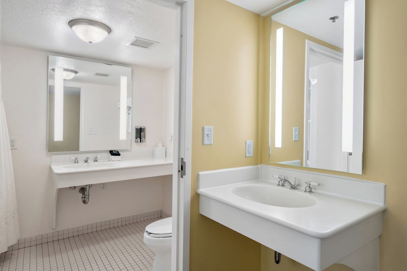 room, 2 queen beds, courtyard view | bathroom | combined shower/bathtub, free toiletries, hair dryer, towels