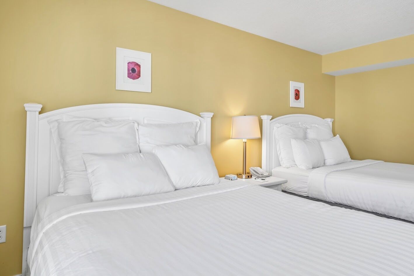 room, 2 queen beds, courtyard view | premium bedding, pillow-top beds, iron/ironing board, free wifi