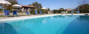 Outdoor pool, open 9:00 AM to 7:30 PM, pool umbrellas, pool loungers