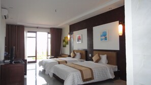 Deluxe Room, Ocean View | Premium bedding, down comforters, desk, blackout drapes