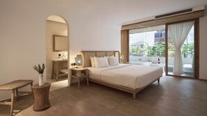 A hotel room with a large bed, a bedside table with a lamp, a small table with a vase, and a large window with curtains. -  Sky Gem Hotel Sora (Ho Chi Minh City)
