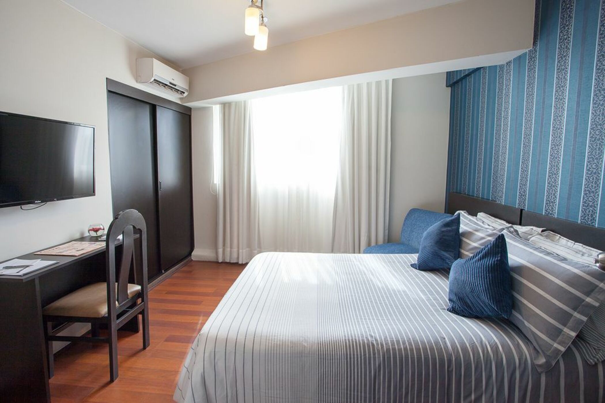 Down comforters, memory foam beds, in-room safe, WiFi (free)