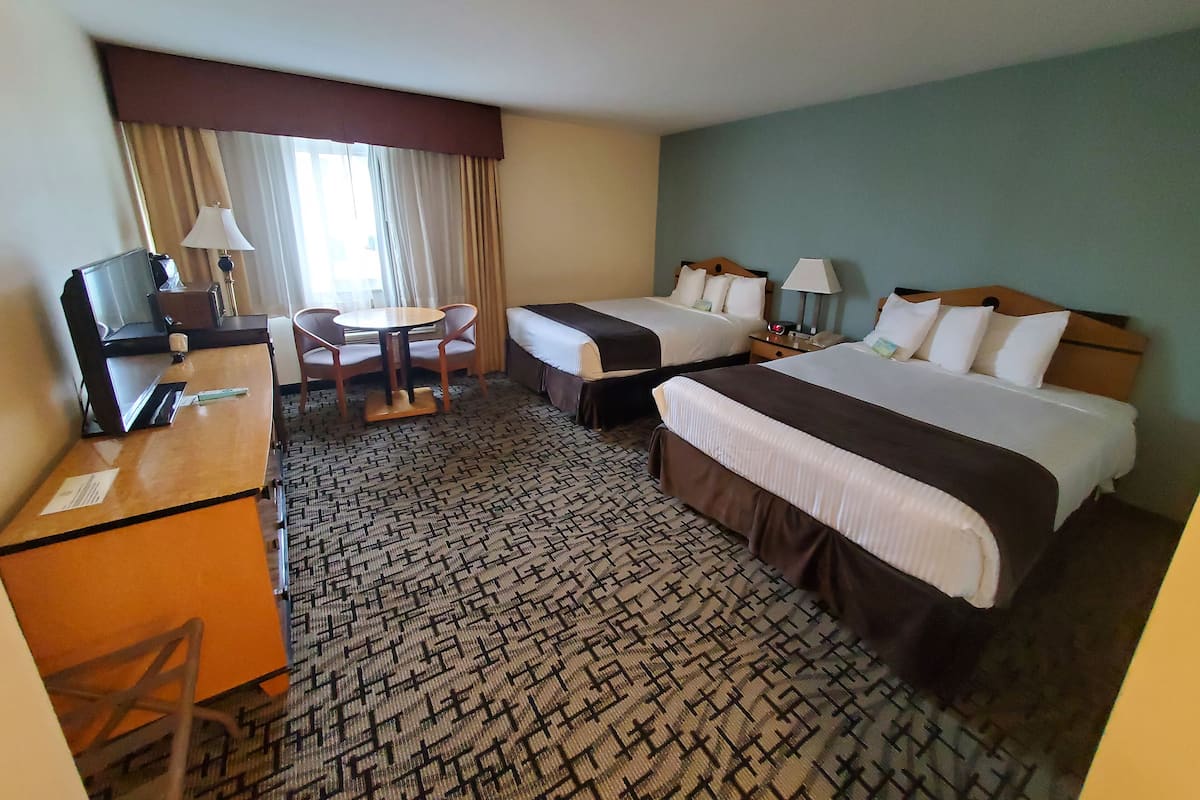 Standard Room, 2 Queen Beds, Non Smoking | Pillowtop beds, individually furnished, desk, iron/ironing board