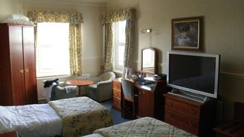 Family Room | Premium bedding, blackout drapes, iron/ironing board, rollaway beds