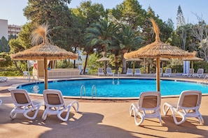 Outdoor pool, open 10:00 AM to 6:00 PM, pool umbrellas, sun loungers