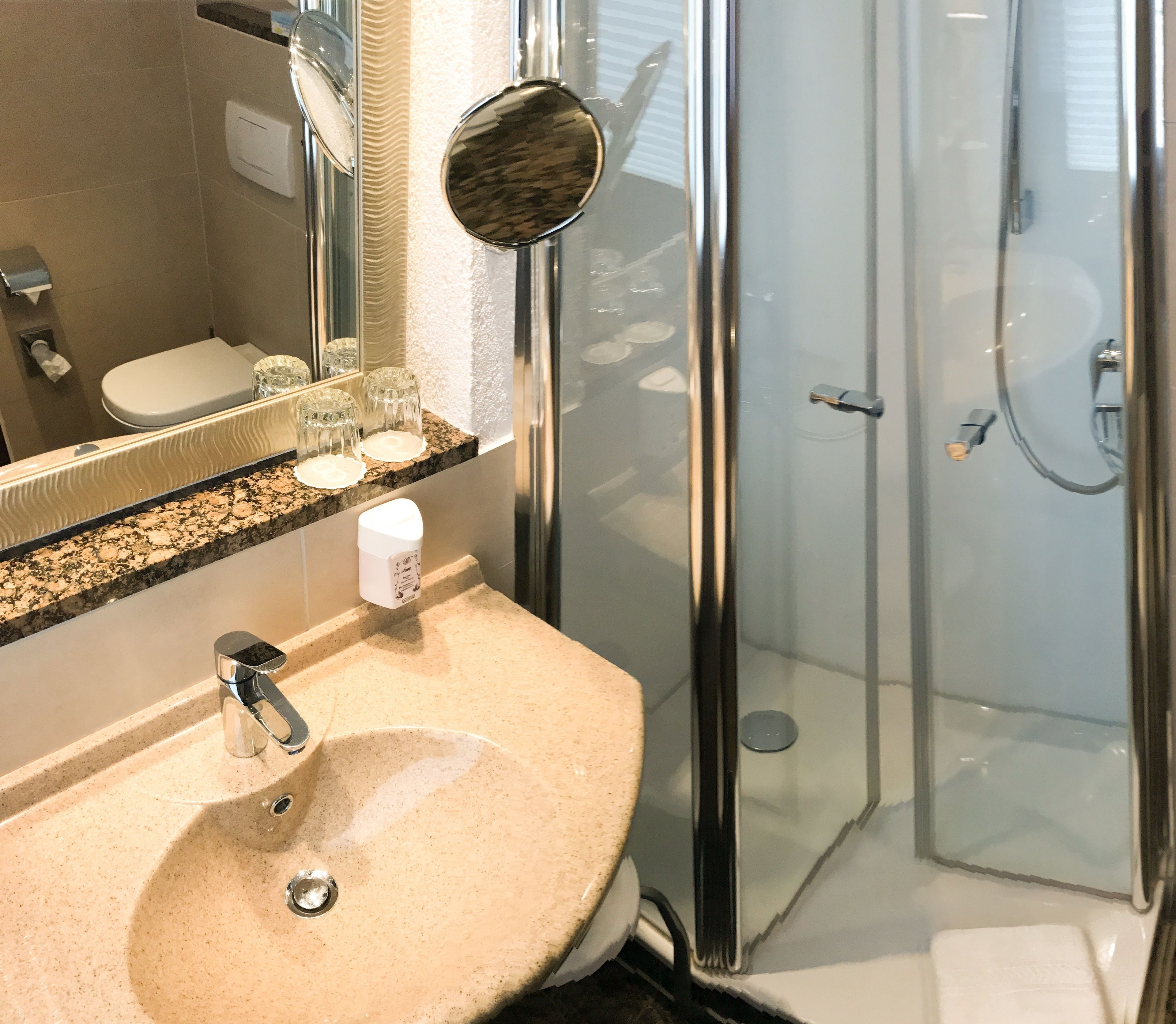 shower, free toiletries, hair dryer, towels