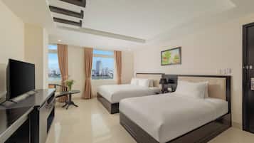 Family Quadruple Room, River View | Minibar, in-room safe, desk, blackout drapes