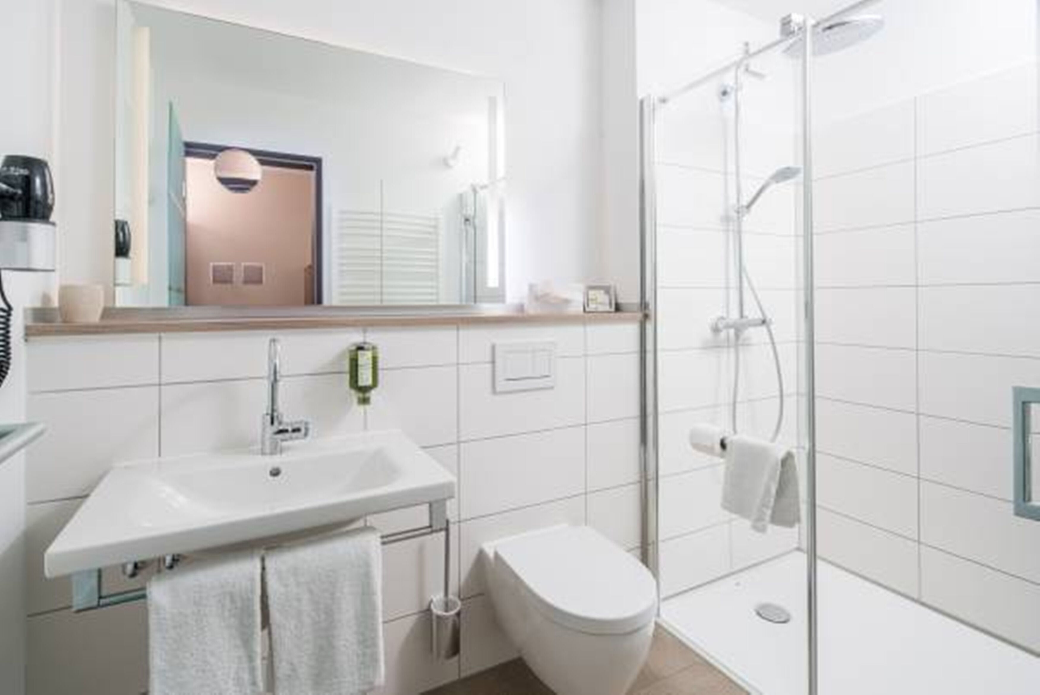 comfort single room | bathroom | shower, hair dryer, slippers, towels