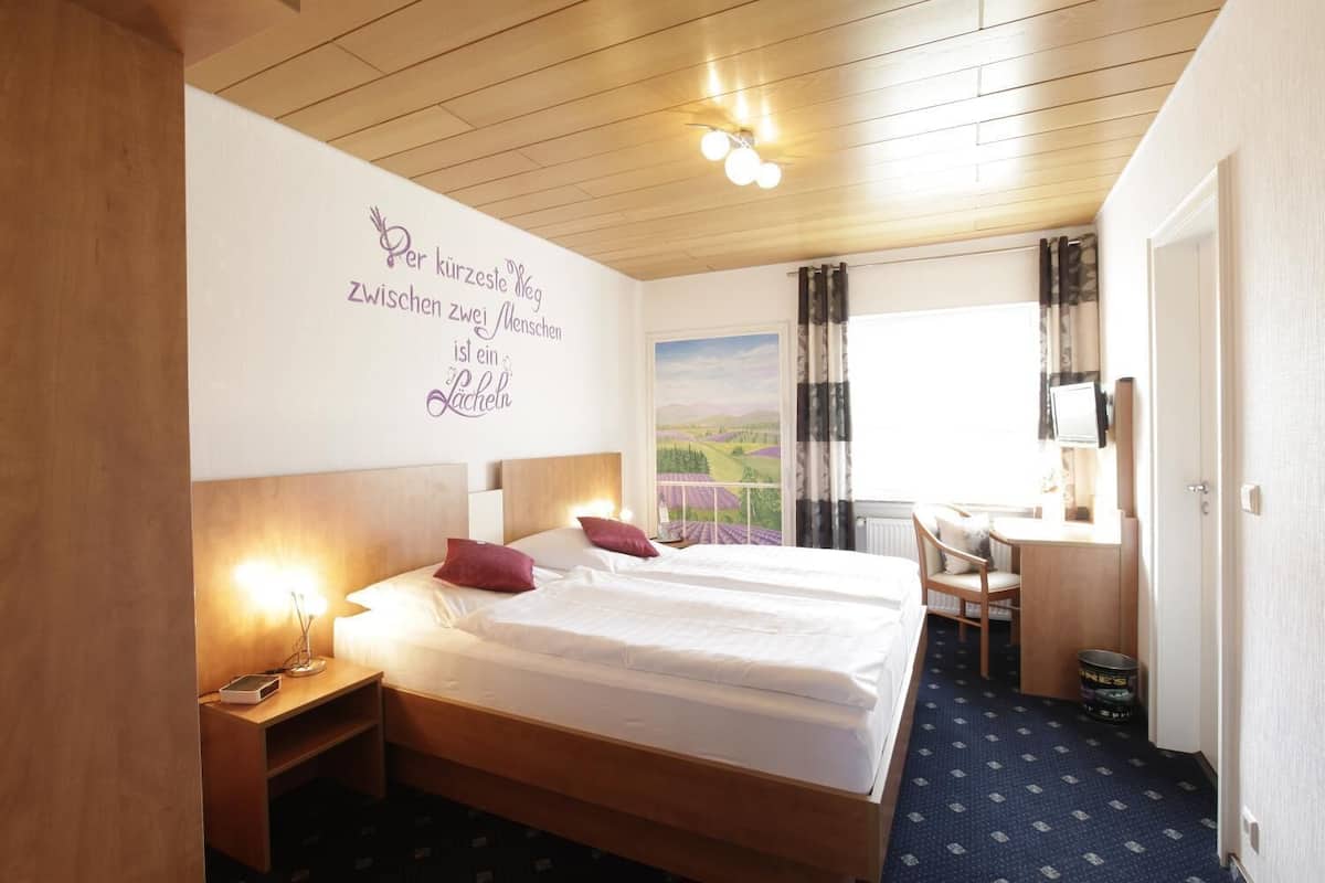 desk, laptop workspace, blackout curtains, iron/ironing board