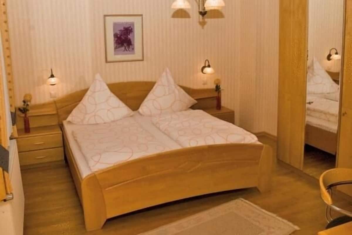 desk, laptop workspace, blackout curtains, iron/ironing board