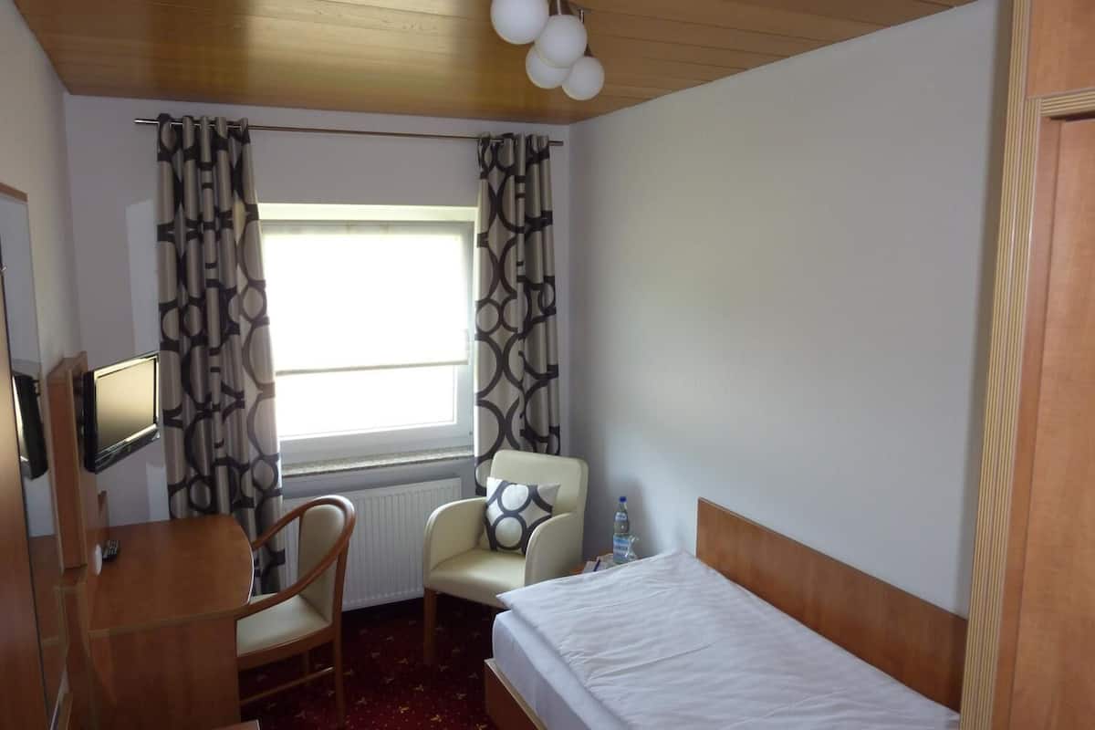 desk, laptop workspace, blackout curtains, iron/ironing board