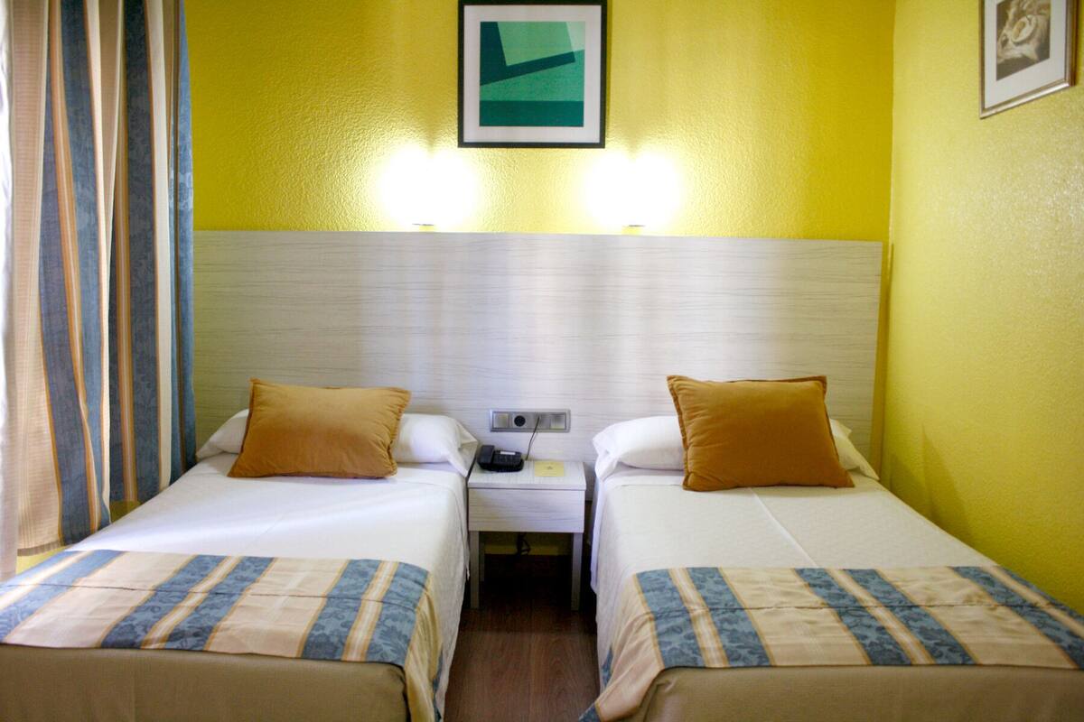 20 bedrooms, desk, laptop workspace, blackout curtains