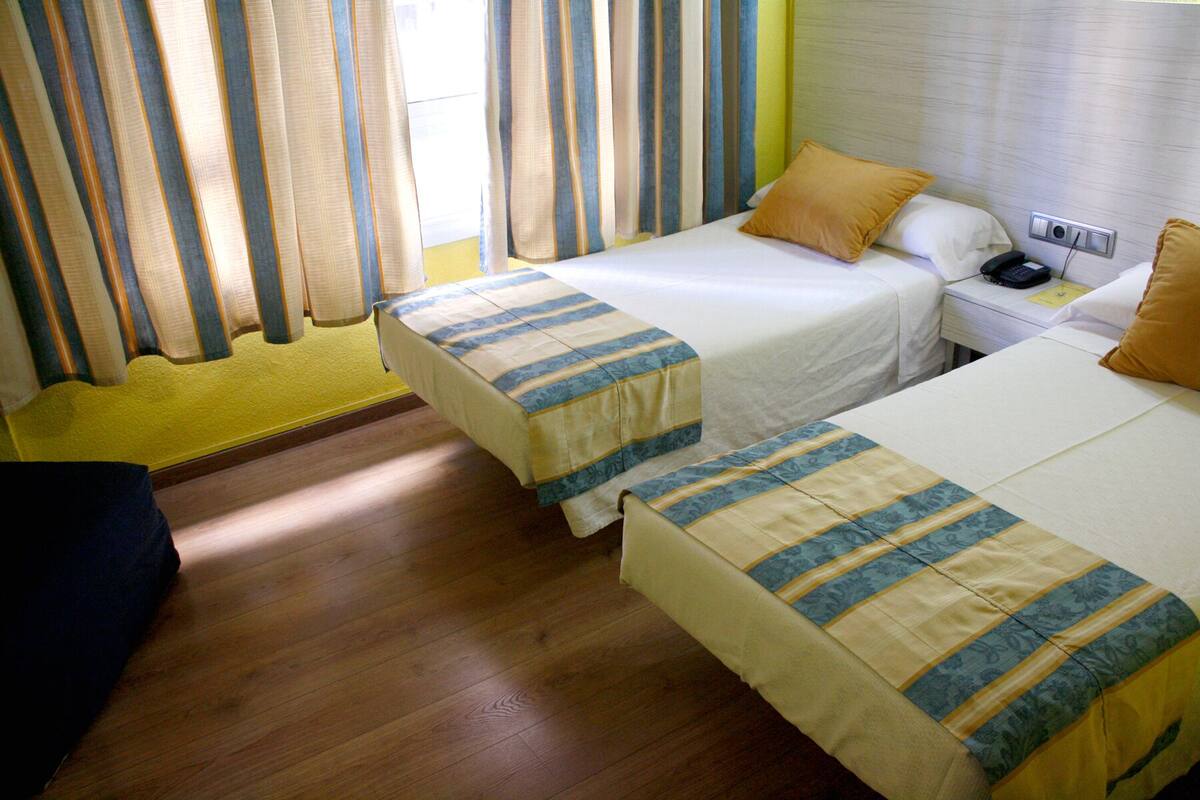 20 bedrooms, desk, laptop workspace, blackout curtains
