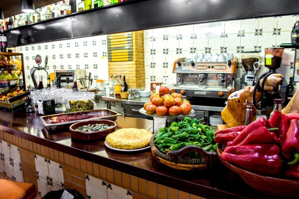 Breakfast, lunch, dinner served; local cuisine