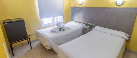 Traditional Twin Room | 20 bedrooms, desk, laptop workspace, blackout drapes