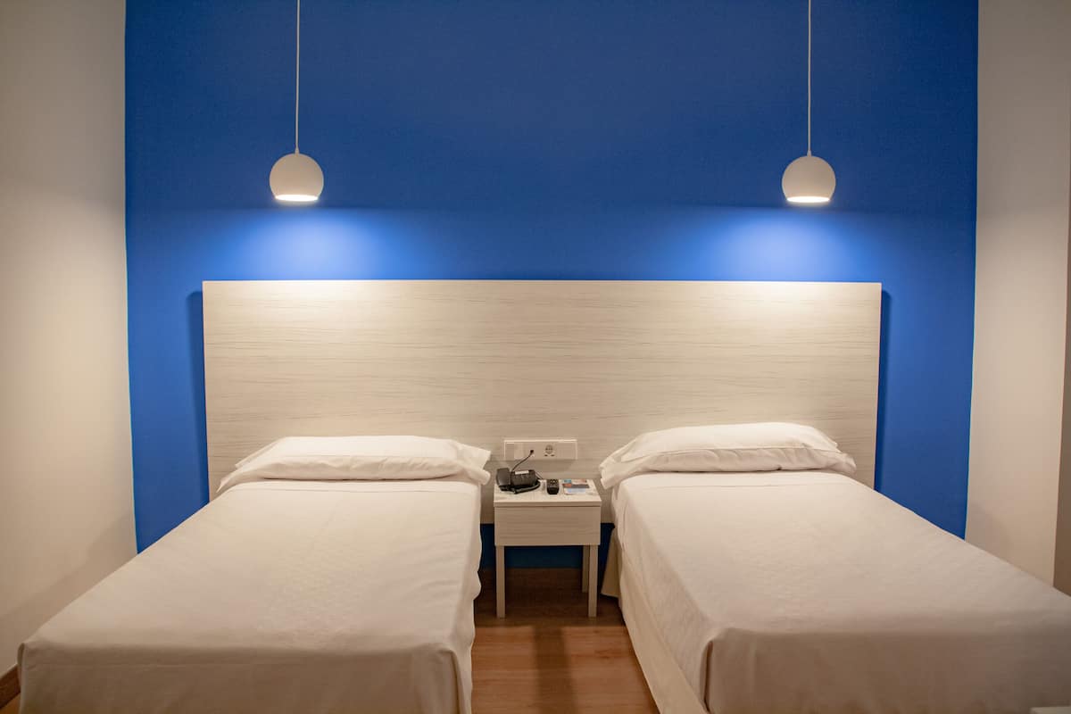 20 bedrooms, desk, laptop workspace, blackout curtains