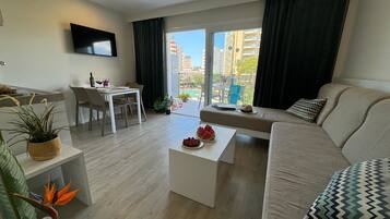 Superior-lejlighed - 1 soveværelse - balkon | Opholdsområde | Tv