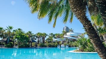 Indoor pool, pool umbrellas, pool loungers