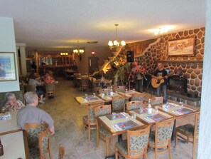 Breakfast, lunch, dinner served; local cuisine 