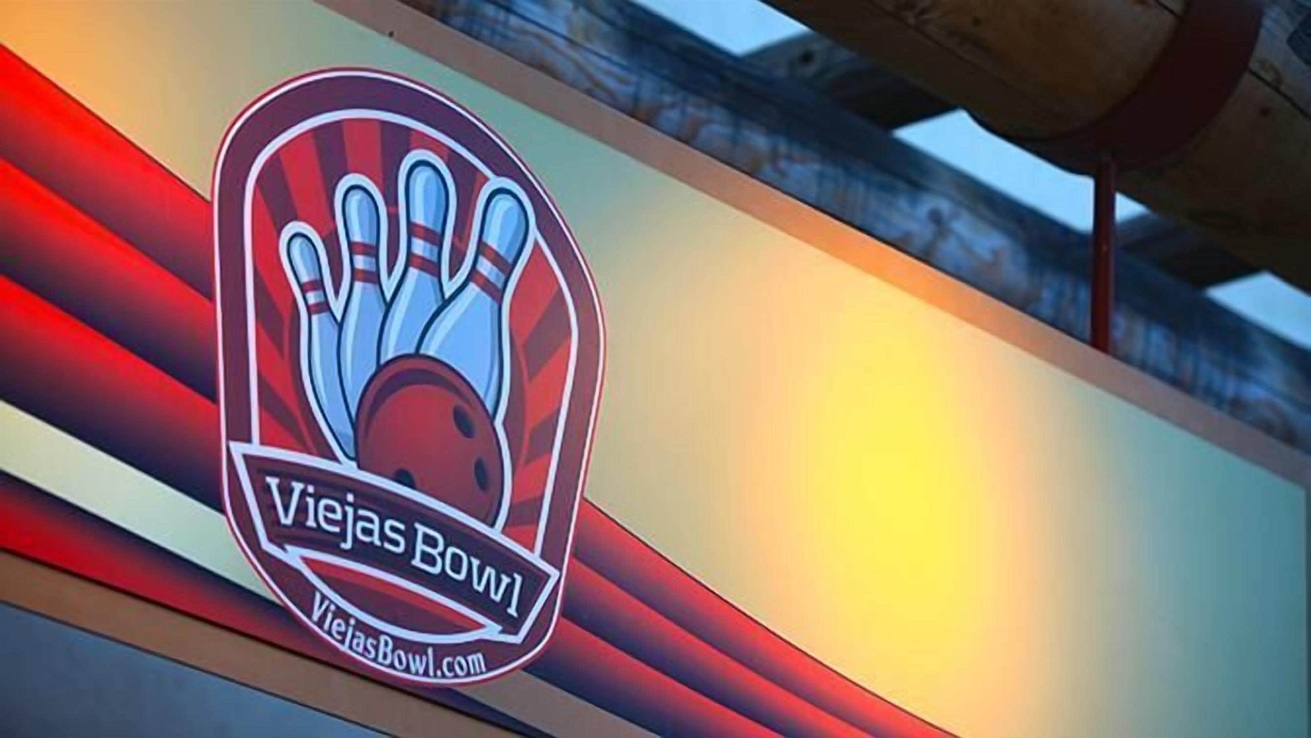 A bowling alley sign with the text "Viejas Bowl" and a website address "ViejasBowl.com".