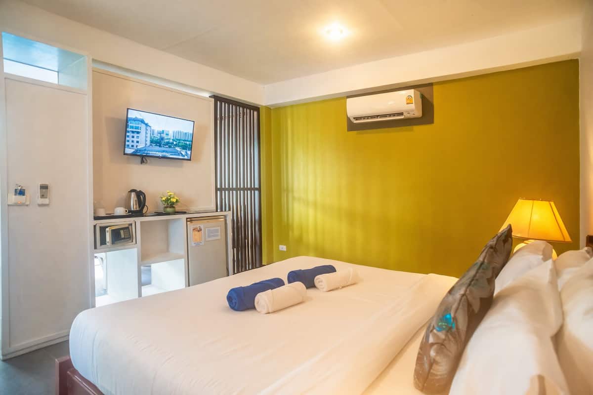 Superior Mini Suite Pool View | Minibar, in-room safe, individually furnished, desk