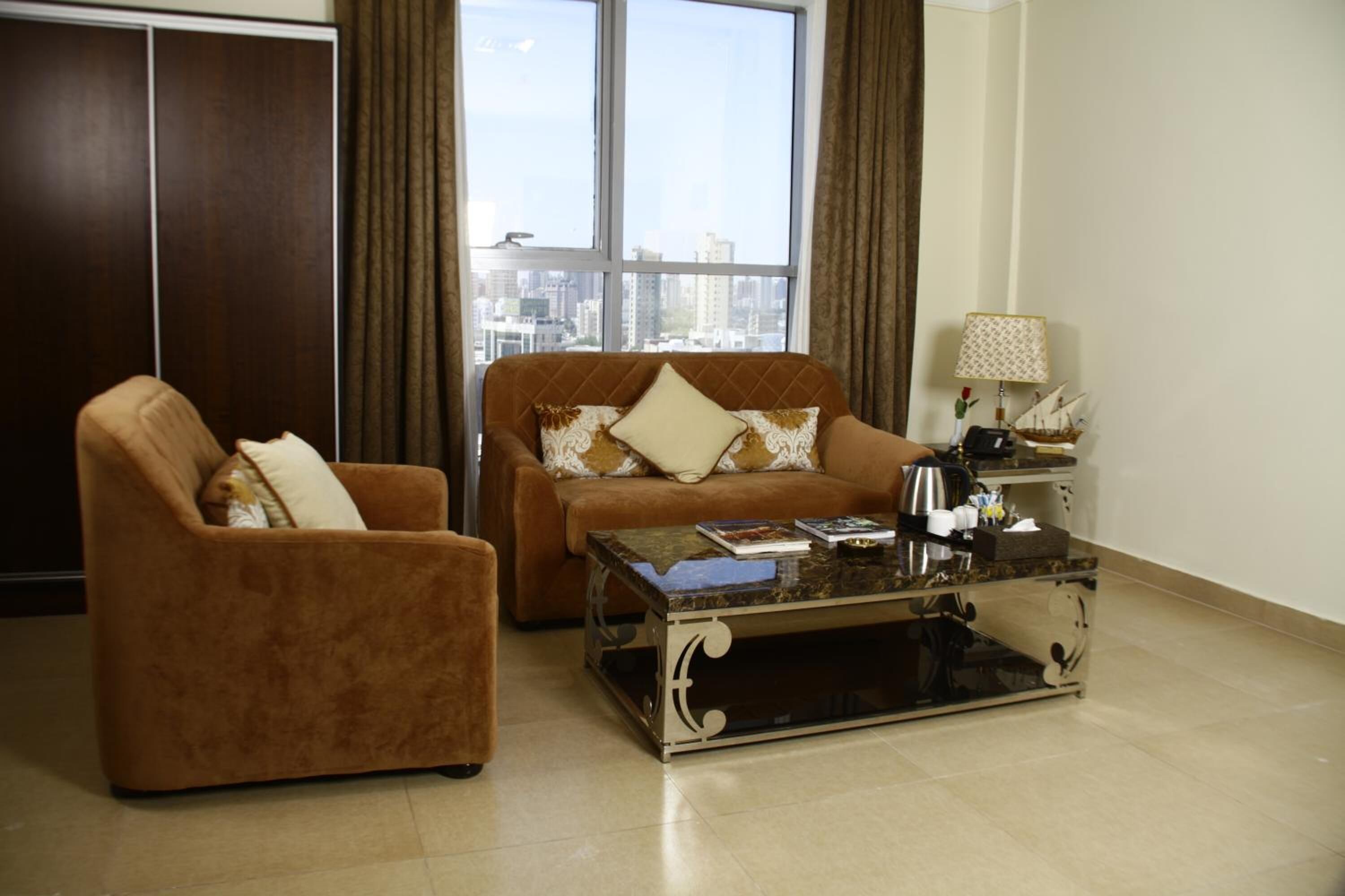 Foto - Laguna Hotel Suites