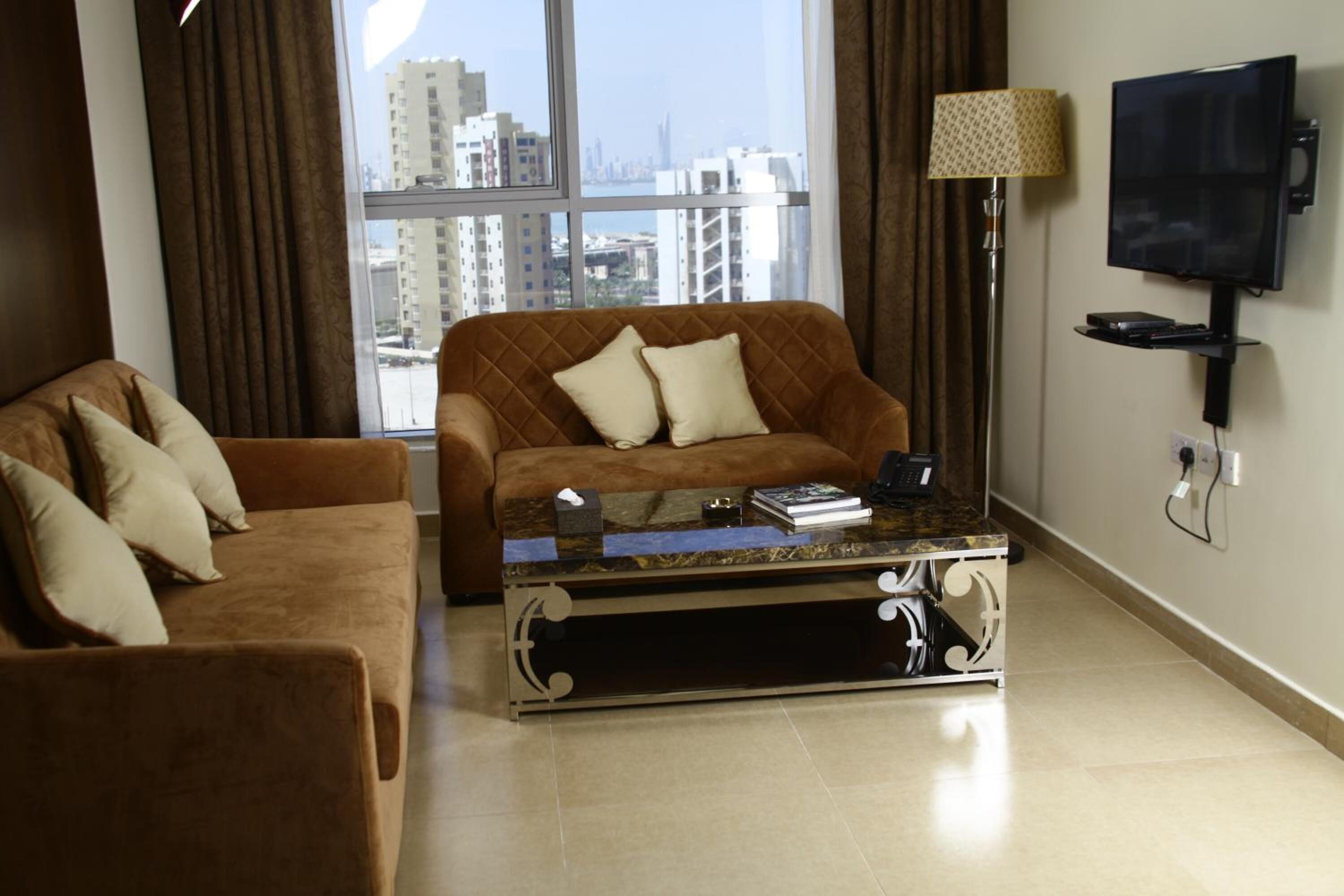 Foto - Laguna Hotel Suites