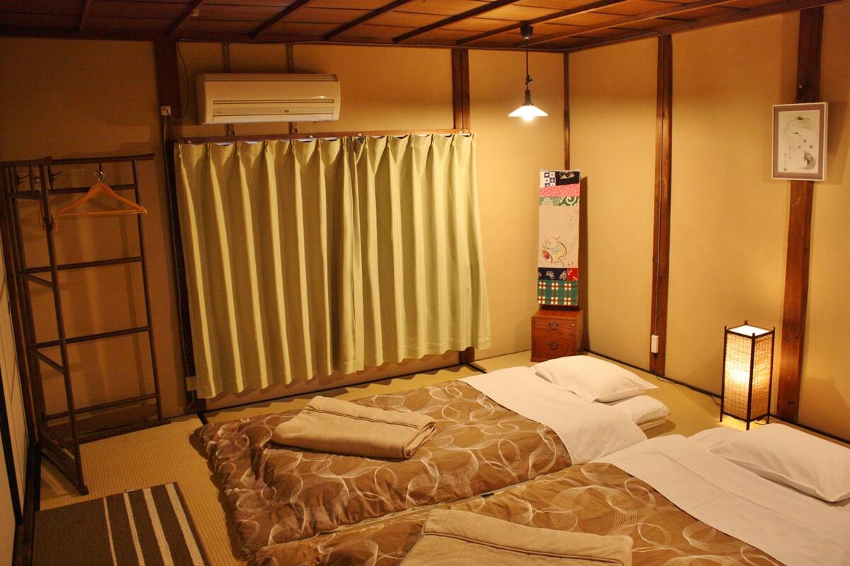 Down comforters, desk, laptop workspace, blackout drapes