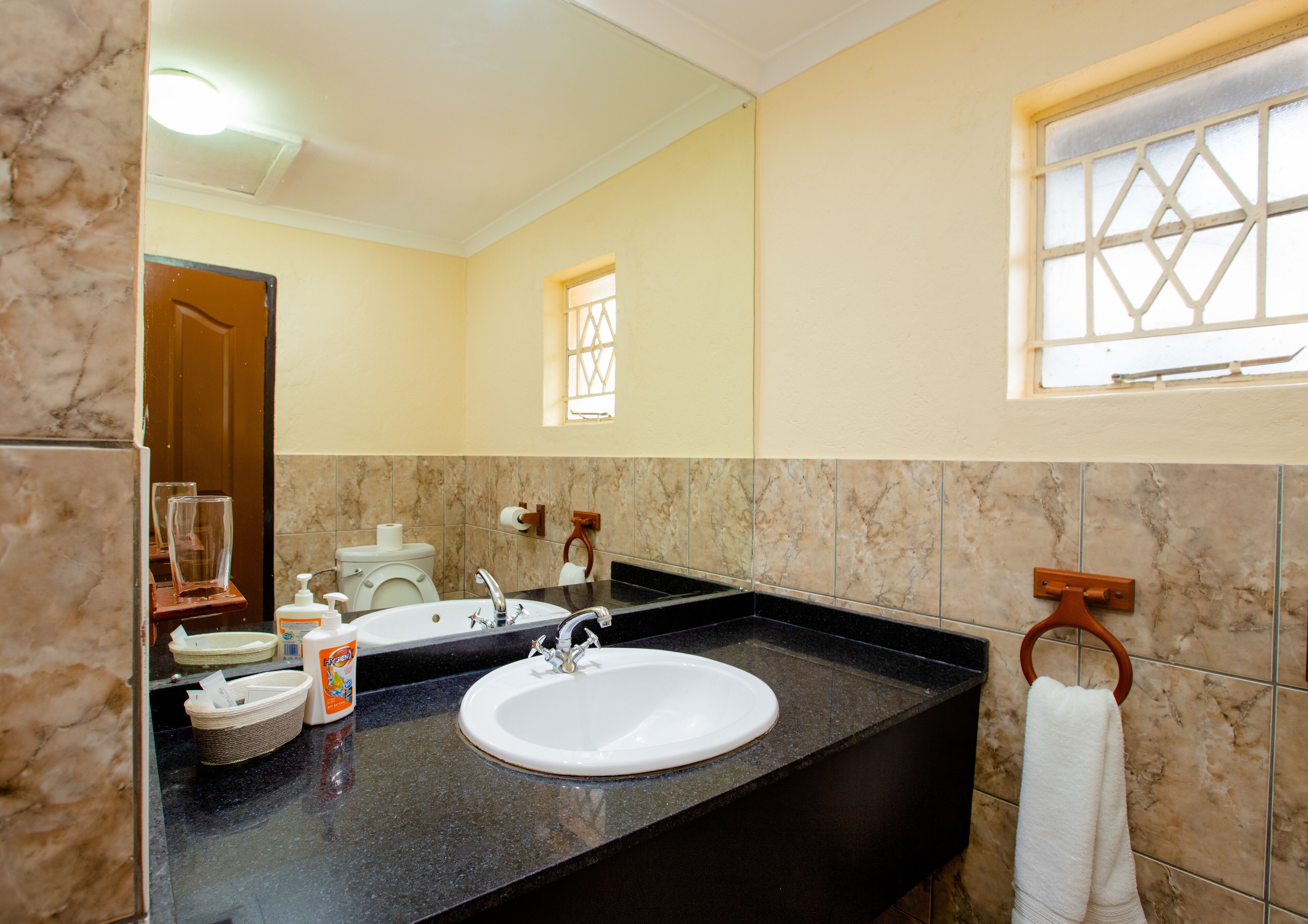 shower, free toiletries, hair dryer, towels