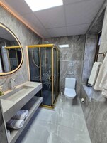 Hair dryer, slippers, towels